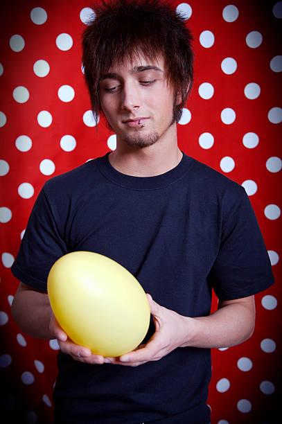 istock teenage young male portraits - easter eggs 91089996
