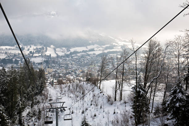 istock Mountain ski resort cableway, ski lift, in winter 910903796