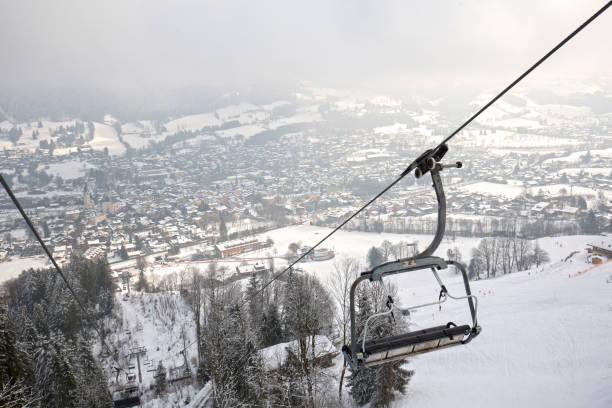 istock Mountain ski resort cableway, ski lift, in winter 910905238