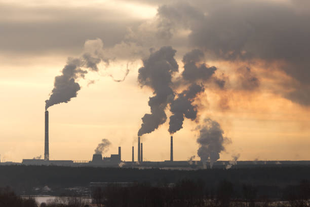 istock Smoke from the pipes in the factory 910905270