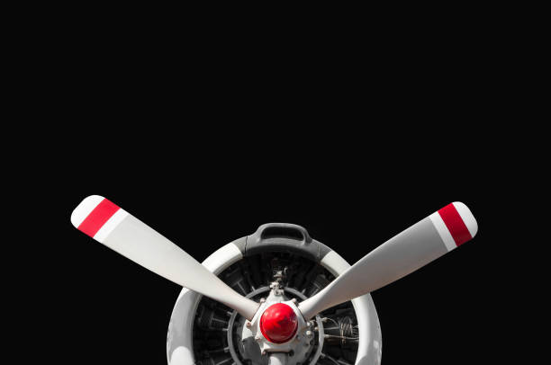 istock Vintage airplane propeller with radial engine on black 910913538