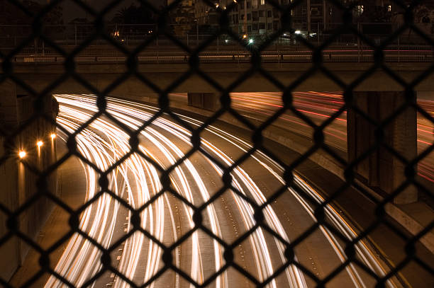 istock San Diego Freeway Traffic through Gate with Long Exposure 91091962