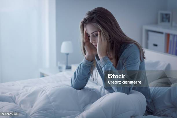 Depressed Woman Awake In The Night Stock Photo - Download Image Now - Insomnia, Sleeping, Women