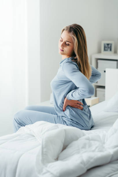 istock Woman with back pain 910925784