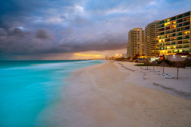 istock Cancun Forum beach sunset in Mexico 910926746