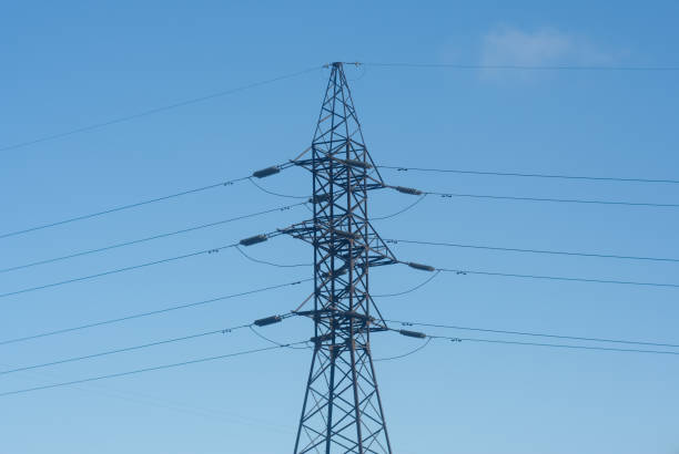 istock High voltage electricity tower with wires, landscape. 910926874