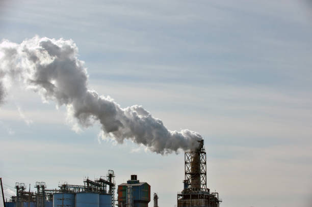 istock Smoking factory chimneys 910932560