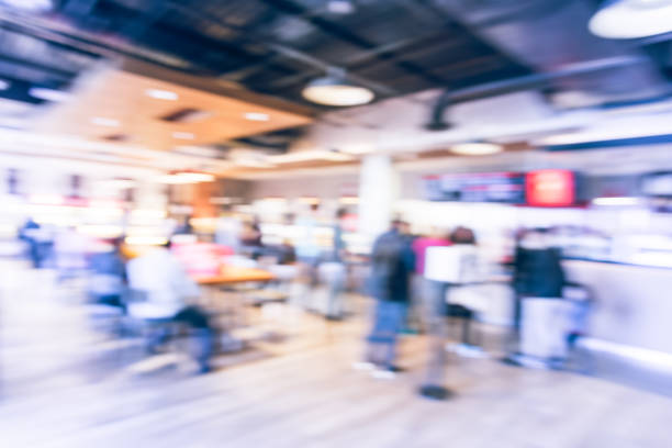 istock Blurred abstract interior open space bakery cafe in America 910932982