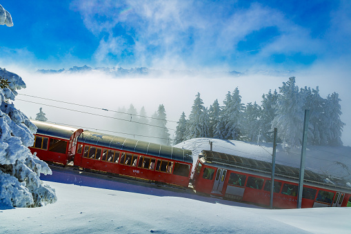 Rigi, Switzerland - February 7, 2015: red cogwheel train. Editorial use
