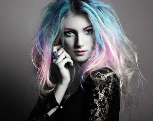 Photo of Beauty fashion model girl with colorful dyed hair