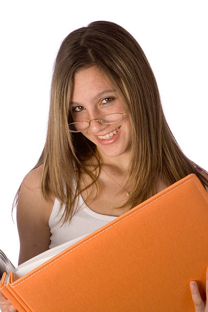 istock pretty teen smiling with book 91093463