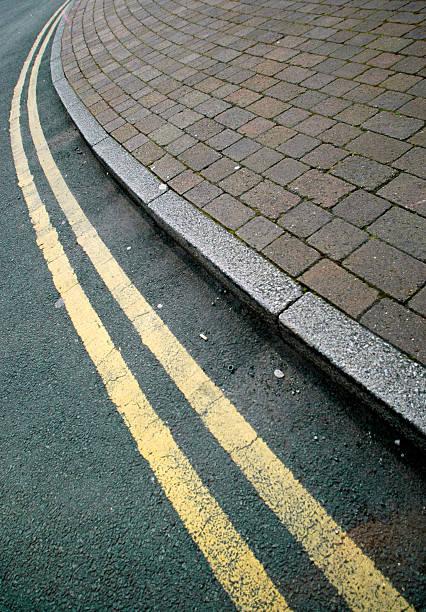 istock Asphalt curve with sidewalk and yellow line 91093924