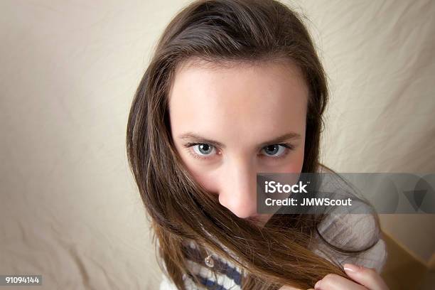 Overhead View Of Brunette With Hair In Face Stock Photo - Download Image Now - 20-29 Years, Adult, Adults Only