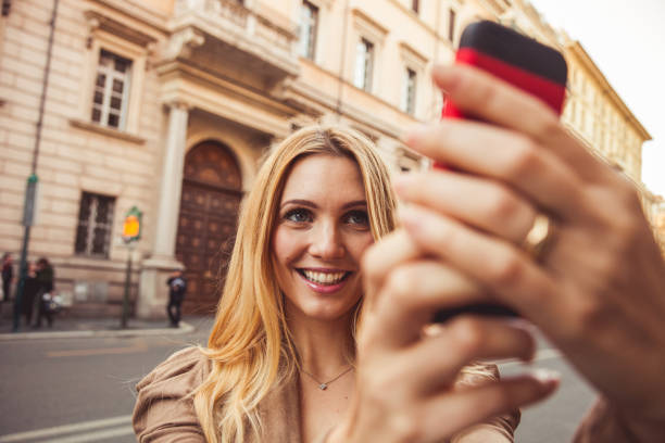 istock Woman takes a selfie in Rome 910942582