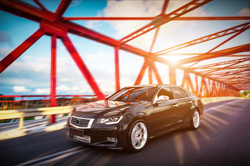 Modern black metallic sedan car on the bridge road. Generic desing, brandless. 3D rendering.