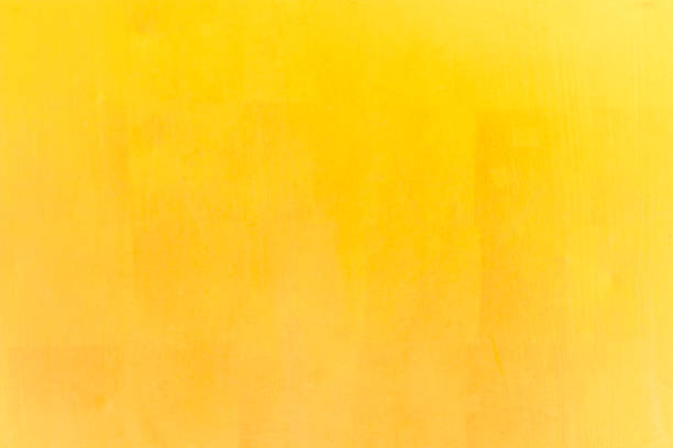 istock Shiny yellow leaf gold foil texture background 910945026