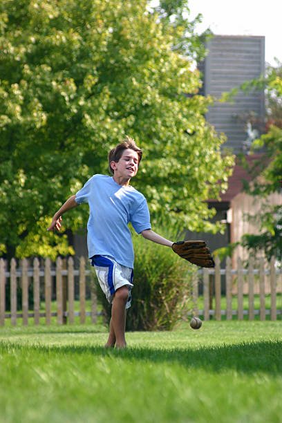 istock Boy Trying to Catch Ball 91094626