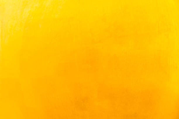 istock Shiny yellow leaf gold foil texture background 910947598