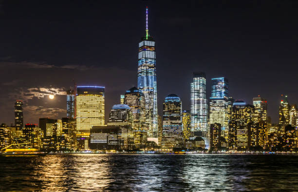 istock new york city manhattan downtown reflection night moon 910954620