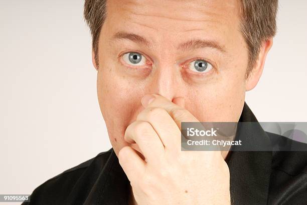 Man In Silky Black Shirt Stock Photo - Download Image Now - Allergy, Black Color, Blue Eyes