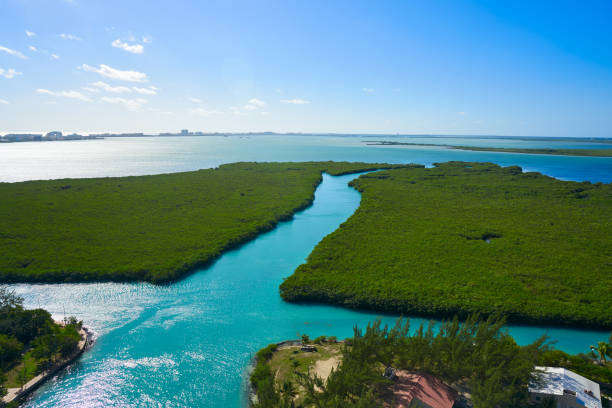 Cancun aerial view of Nichupte Lagoon Cancun aerial view of Nichupte Lagoon at Hotel Zone in Mexico lagoon stock pictures, royalty-free photos & images