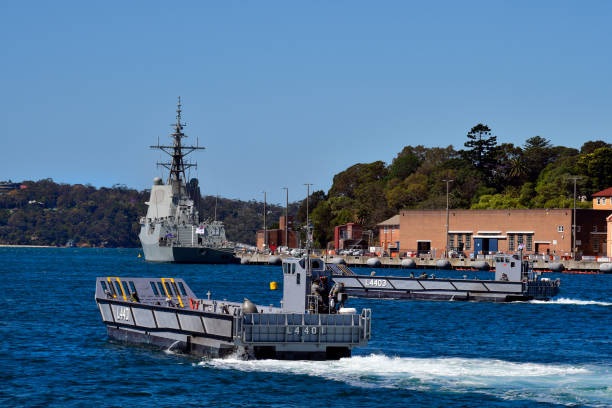 Australia, Navy, Warship Sydney, NSW, Australia - October 31, 2017: HMAS Hobart in Wooloomooloo wharf and exercise with landing crafts of the Royal Australian navy landing craft stock pictures, royalty-free photos & images