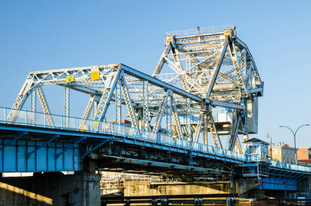 istock Steel Drawbridge against Blue Sky at Sunset 910968544