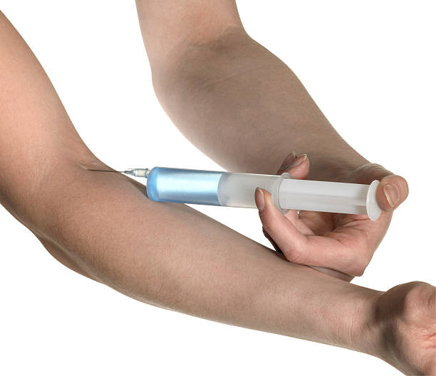 Self Injectin 70+ Iv Drip Injecting Human Arm Inserting Stock Photos, Pictures ...