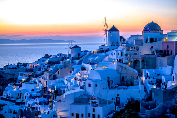istock Houses By Sea During Sunset At Santorini 910976642