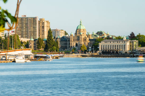 View of Victoria Skyline Lit by a Setting Sun on a Clear Summer Day. Vancouver Island, BC, Canada.