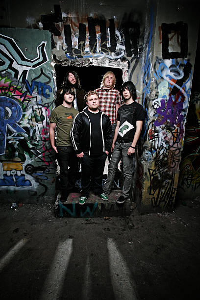 istock Boys Standing in front of Graffiti Covered Wall 91098252