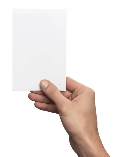 Empty white A6 postcard vertically. Man holding a template isolated in his hand
