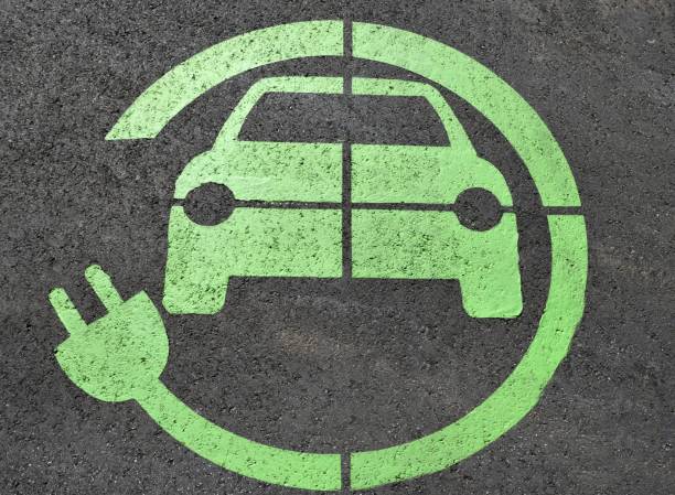 istock Hybrid car charging area 910991746