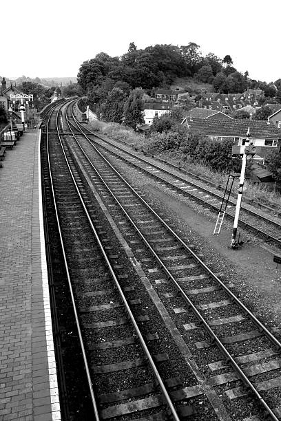 Black and white railway line stock photo