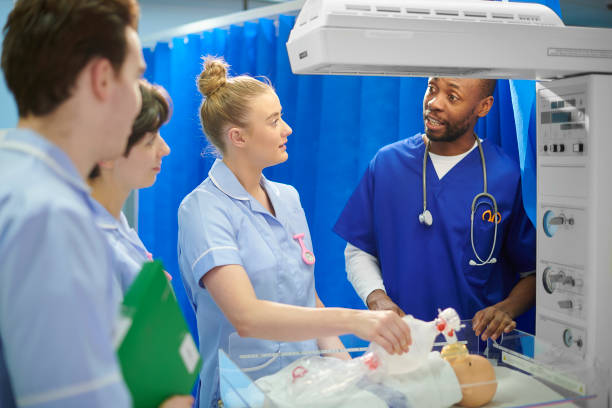 istock medical students with baby simulator 910999820