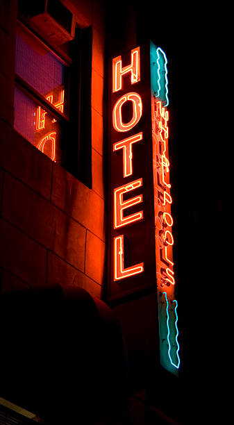 istock Hotel Whirlpools Red Neon Sign Attached to Building at Night 91100675