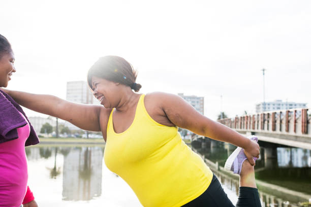 istock Women exercising outdoors 911007230