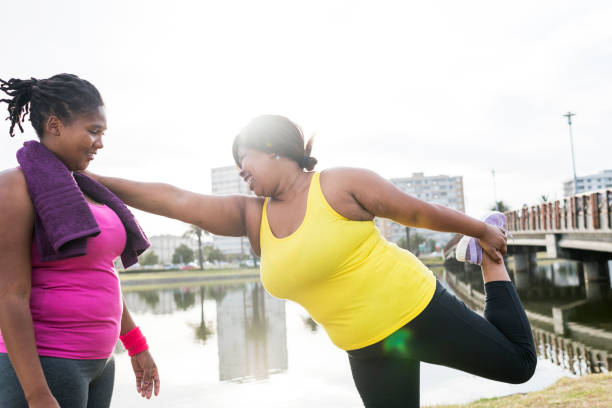 istock Woman stretching outdoors 911007432