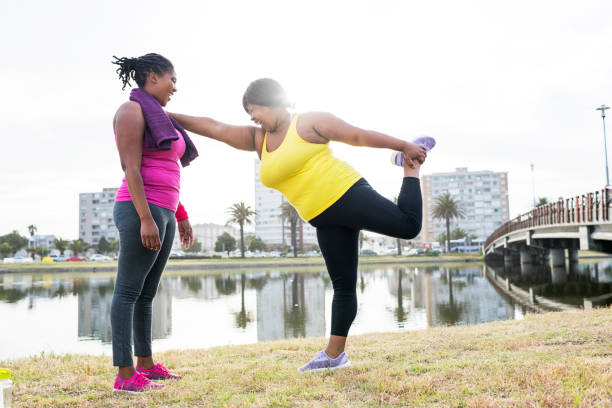 istock Woman stretching outdoors 911007444