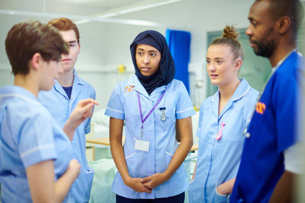 istock young nursing team with senior nurse 911007564
