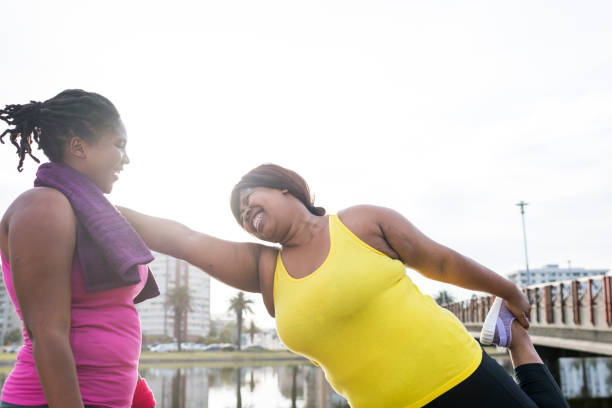 istock Woman stretching outdoors 911007606