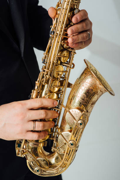 istock A man plays the saxophone close up 911007946