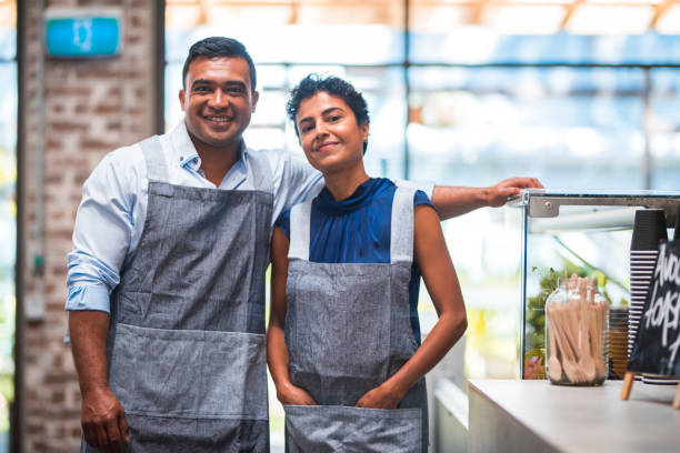 istock Baristas posing at coffee shop 911011564