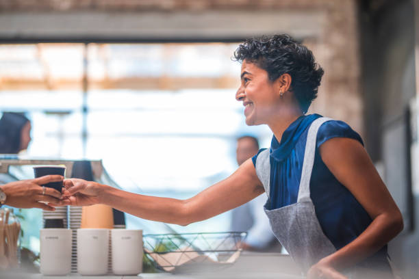 istock Barista serving a coffee at the bar 911011632