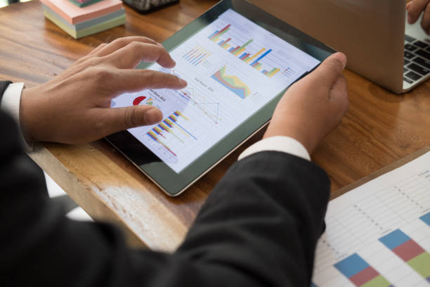 istock business inspector analyze financial plan report. businessman working with new startup project. internal auditor audit performance revenue. 911011814