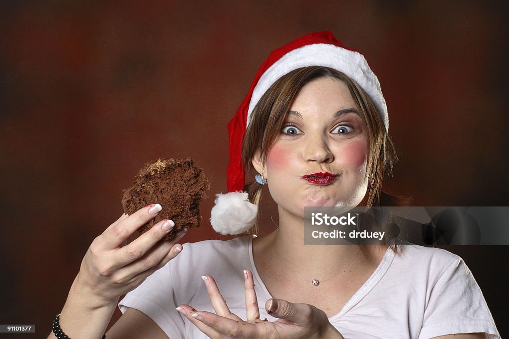 Santa ragazza con torta - Foto stock royalty-free di Natale