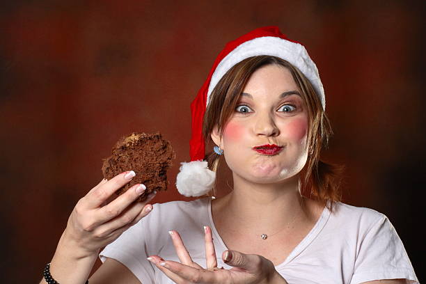 Santa girl with cake stock photo