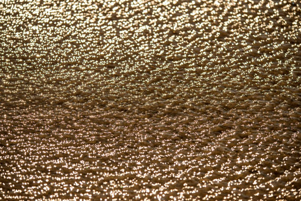 Water of the sea with sun reflections