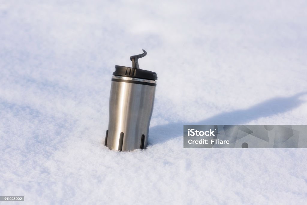 Close Up Picture Of Thermos With Hot Coffee In Snow Of Winter Concept Stock  Photo - Download Image Now - iStock