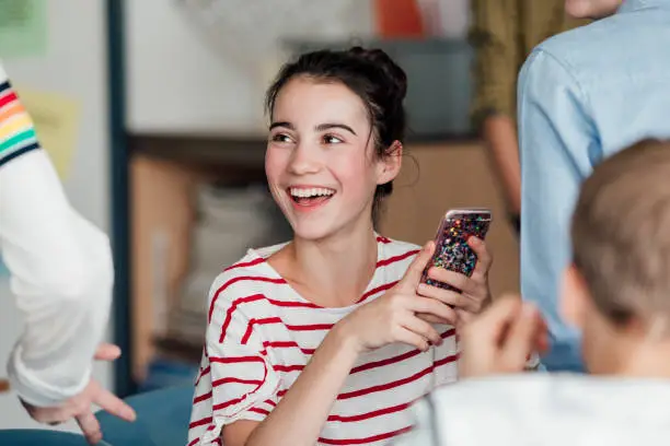 Photo of Teenager Laughing in Class